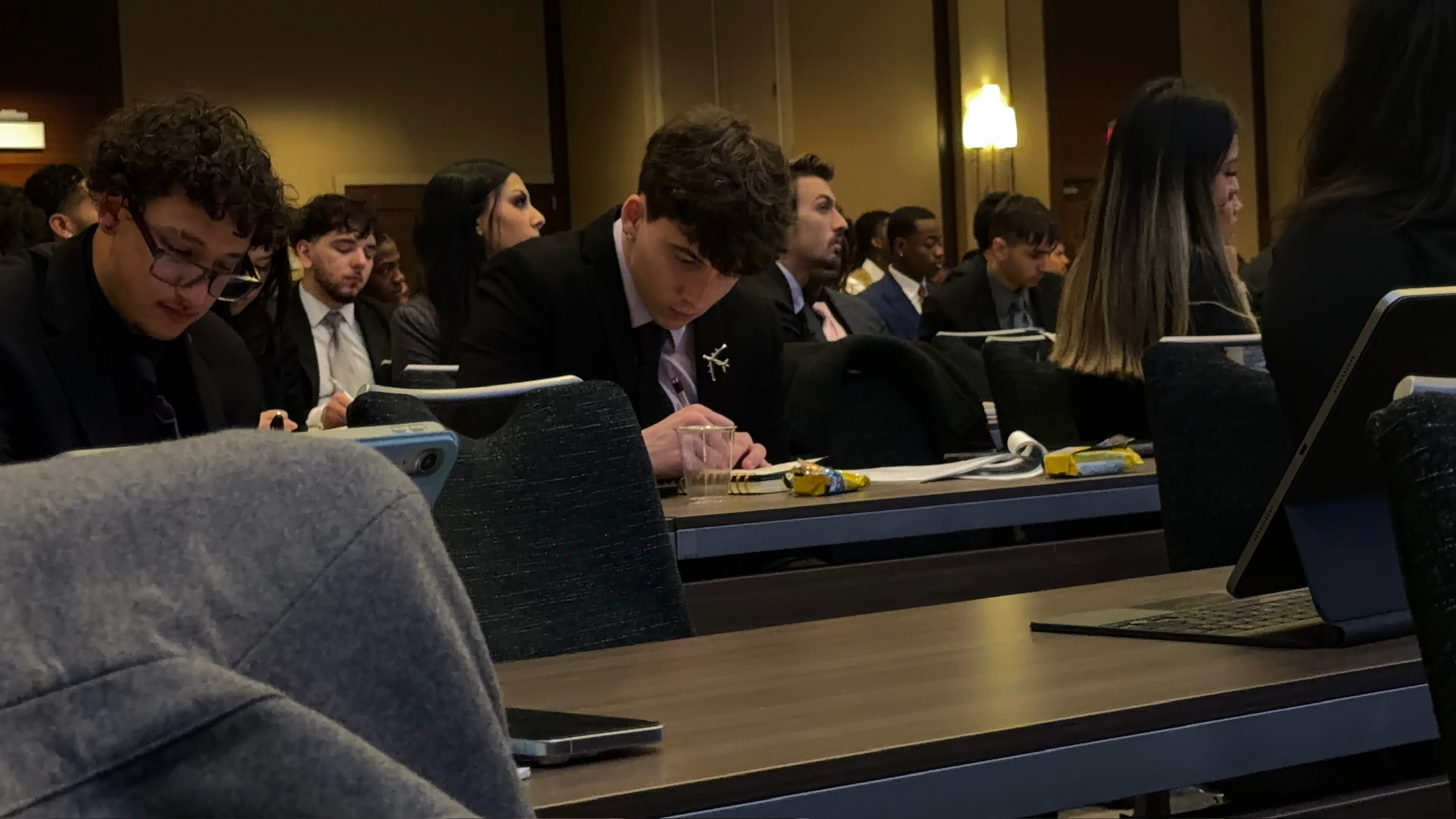 Skyline Consulting team focused during a business conference